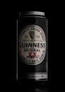 LONDON, UK - MAY 29, 2017: Alluminium can of Guinness original beer on black. Guinness beer has been produced since 1759 in Dublin Royalty Free Stock Photo