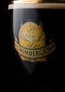 LONDON, UK - MAY 03, 2018: Cold Glass of Grimbergen dubbel beer on black.