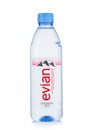 LONDON,UK - MAY 10, 2022: Evian mineral still water bottle on white background