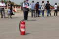 LONDON, UK - MAY 8 2016: Fire extinguisher sits in Tiananmen Square in cash of a self-immolation protest