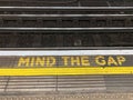 Mind The Gap painted in yellow on a London Underground Platform. London, UK. May 4, 2023.
