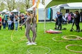 People playing with hula hoop in festival, London