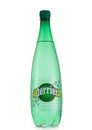 LONDON,UK - MAY 14, 2022: Perrier mineral carbonated water in large plastic bottle on white background. roduct of France Royalty Free Stock Photo