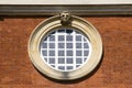 Round window at Hampton Court Palace which was originally built for Cardinal Thomas Wolsey 1515, later