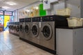 Coin laundries and cloth dryers in a self-service launderlette