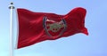 Seamless slow motion with the flag of Arsenal Football Club waving in the wind on a clear day