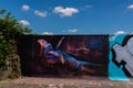 LONDON, UK - MAY 21, 2019 street art paintings panorama on the wall in the park in London, a wall where street artists can present