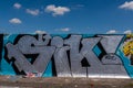 LONDON, UK - MAY 21, 2019 street art paintings panorama on the wall in the park in London, a wall where street artists can present