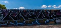 LONDON, UK - MAY 21, 2019 street art paintings panorama on the wall in the park in London, a wall where street artists can present