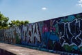 LONDON, UK - MAY 21, 2019 street art paintings panorama on the wall in the park in London, a wall where street artists can present