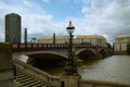 London\UK - 29 May 2022: View over brown coloured / colored River Thames London and Lambeth bridge and millbank tower on sunny da Royalty Free Stock Photo