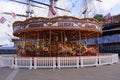 London, UK: Merry-go-round carusel near the Cutty Sark in Greenwich village