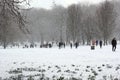 London, uk, 2nd march 2018 - Green Park covered in snow as comuters walk to work beast from the east meets storm sally Royalty Free Stock Photo