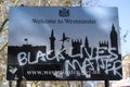 London, UK - 15 Nov 2020: Black Lives Matter graffiti on the Welcome to Westminster sign in central London