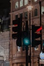 Female gender symbols celebrating same-sex relationships on traffic light in Trafalgar Square, London, UK