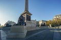 Nelson`s column and lion statue at Trafalgar Square for tourist attraction in London Royalty Free Stock Photo