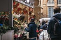 People at florist stall inside Liverpool Street station, London, UK Royalty Free Stock Photo