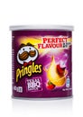 LONDON, UK - November 17, 2017: Pringles potato chips barbeque in mini tube on white. Potato and wheat-based stackable snack chips Royalty Free Stock Photo