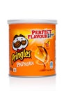 LONDON, UK - November 17, 2017: Pringles potato chips paprica in mini tube on white. Potato and wheat-based stackable snack chips Royalty Free Stock Photo