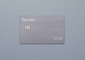 LONDON,UK - NOVEMBER 18, 2022: Revolut visa contactless card on grey background