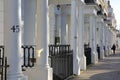 LONDON, UK - NOVEMBER 28, 2016: Row of white luxury houses facades in South Kensington Royalty Free Stock Photo