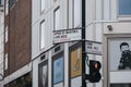 Street name signs on a corner of Long Acre and Upper St Martins Lane streets, City of Westminster, London, UK