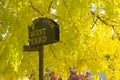 Camden Lock west yard sign under a tree with yellow leaves in autumn Royalty Free Stock Photo