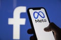 LONDON, UK - October 2021: Facebook social media company changes its corporate name to Meta