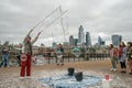 London, UK - October 2019: Giant soap bubbles show - street performers entertain tourists Royalty Free Stock Photo