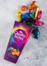 LONDON, UK - OCTOBER 10, 2019: Opened Gift box of Nestle Quality Street mix chocolate candies on light background