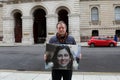 London, UK, 26 October 2021: Richard Ratcliffe holds up a photo of his wife Nazanin Zaghari-Ratcliffe outside the Foreign,