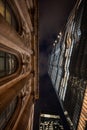 London, UK: Old and new buildings in the City of London seen from Bishopsgate at night with Gibson Hall and 22 Bishopsgate