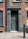 Painted doorway at entrance to traditional Huguenot weaver`s house on Princelet Street, Spitalfields, East London UK