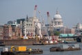 London UK. Panoramic view of the iconic dome of St Paul`s Cathedral, the River Thames, cranes and buildings under construction Royalty Free Stock Photo