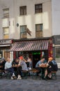 London, UK: People sitting outside a cafe bar on Lower Marsh near Waterloo Station in London.
