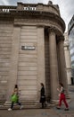 London, UK: People walking past the Bank of England on Threadneedle Street in the City of London Royalty Free Stock Photo
