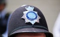 police hat helmet famous bobby metropolitan closeup with copy space