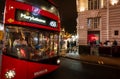 London, UK: Red London bus at the junction of Piccadilly Circus and Regent Street Royalty Free Stock Photo