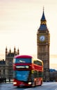 London, the UK. Red bus in motion and Big Ben, the Palace of Westminster. The icons of England Royalty Free Stock Photo