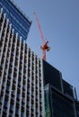 Red crane on top of 40 Leadenhall Street in London, UK