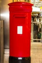 Red English pillar box or post box. Royalty Free Stock Photo