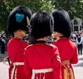 Royal Guard soldiers having an intimate conversation during the Trooping the Colour military ceremony, held once a year in London