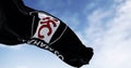 flag of Fulham Football Club waving in the wind on a clear day