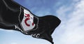 flag of Fulham Football Club waving in the wind on a clear day