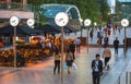 LONDON, UK - 7 SEPTEMBER, 2015: Canary Wharf night life. People sitting in local restaurant after long hours working day Royalty Free Stock Photo