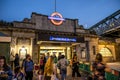 London, UK - September 14, 2023: The entrance to the Embankment underground station at night