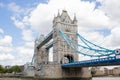 Low Angle View of the Iconic Tower Bridge Under a Cloudy Blue Sky Royalty Free Stock Photo