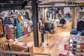 London, UK - September 14, 2023: Modern interior view of Uniqlo store Battersea Station shopping mall