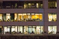 LONDON, UK - 7 SEPTEMBER, 2015: Office building in night light. Canary Wharf night life Royalty Free Stock Photo