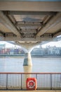 Orange Emergency Floatation Device Along the River Thames in London, UK